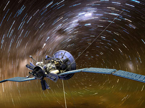 Satellite on star trails