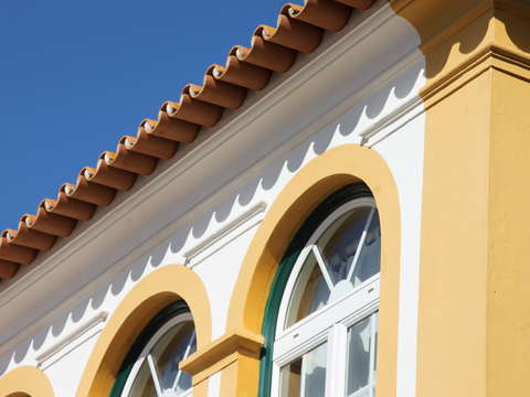 Yellow building with tile roof
