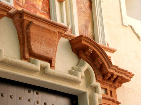 Canopy over wood studded door