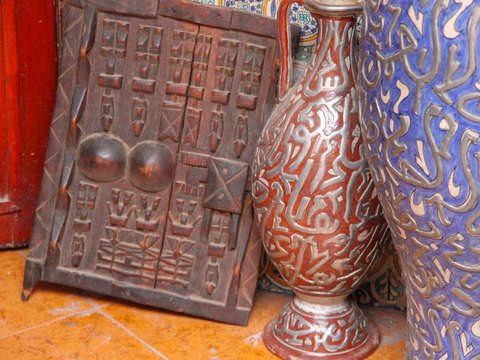 Vases and wooden shutter