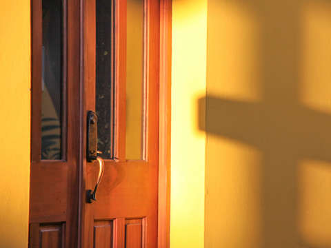 Door with shadow of cross