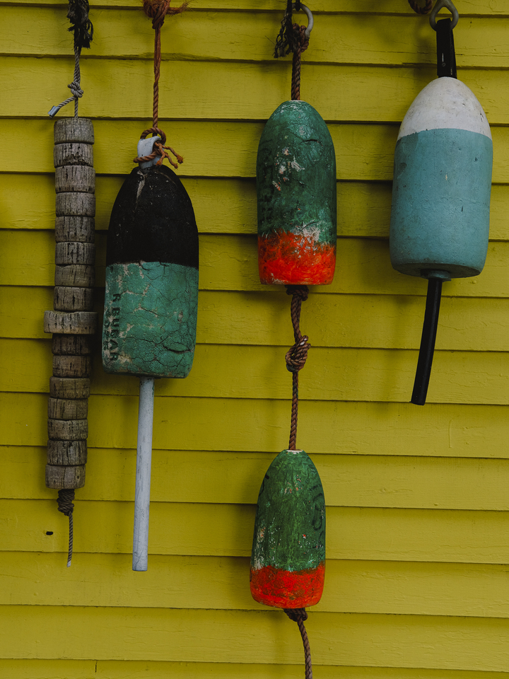 lobster buoys on yellow wall no. 2