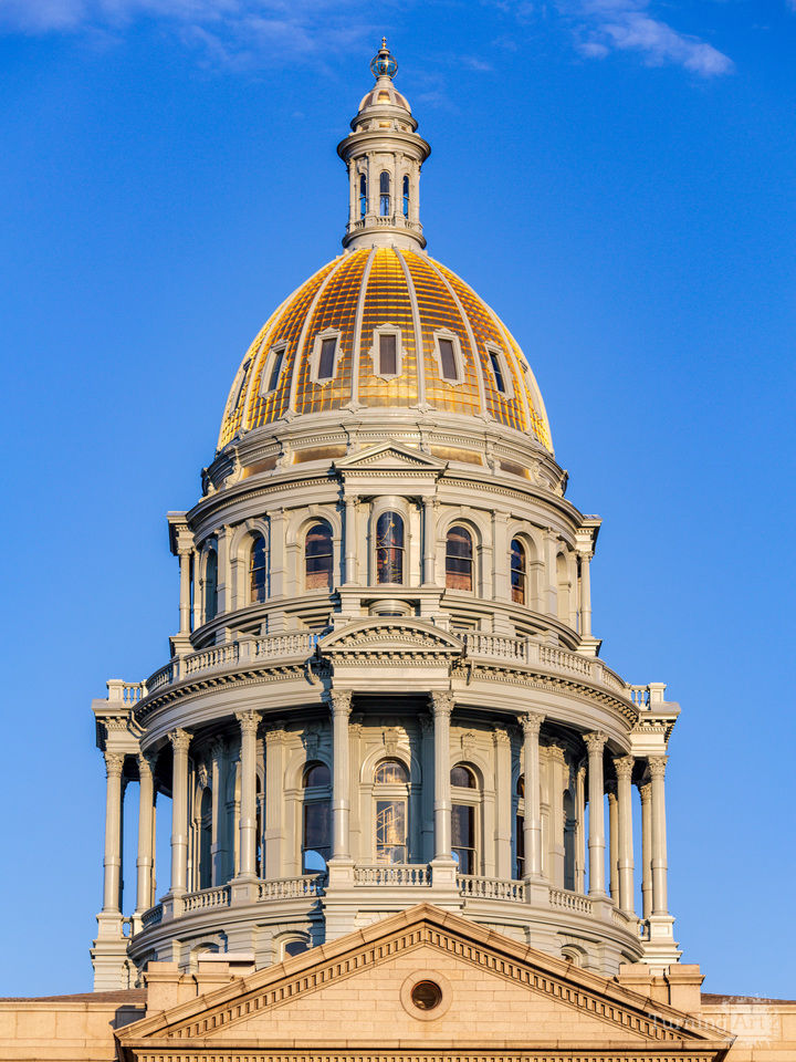 The golden dome of the State Capitol of Colorado