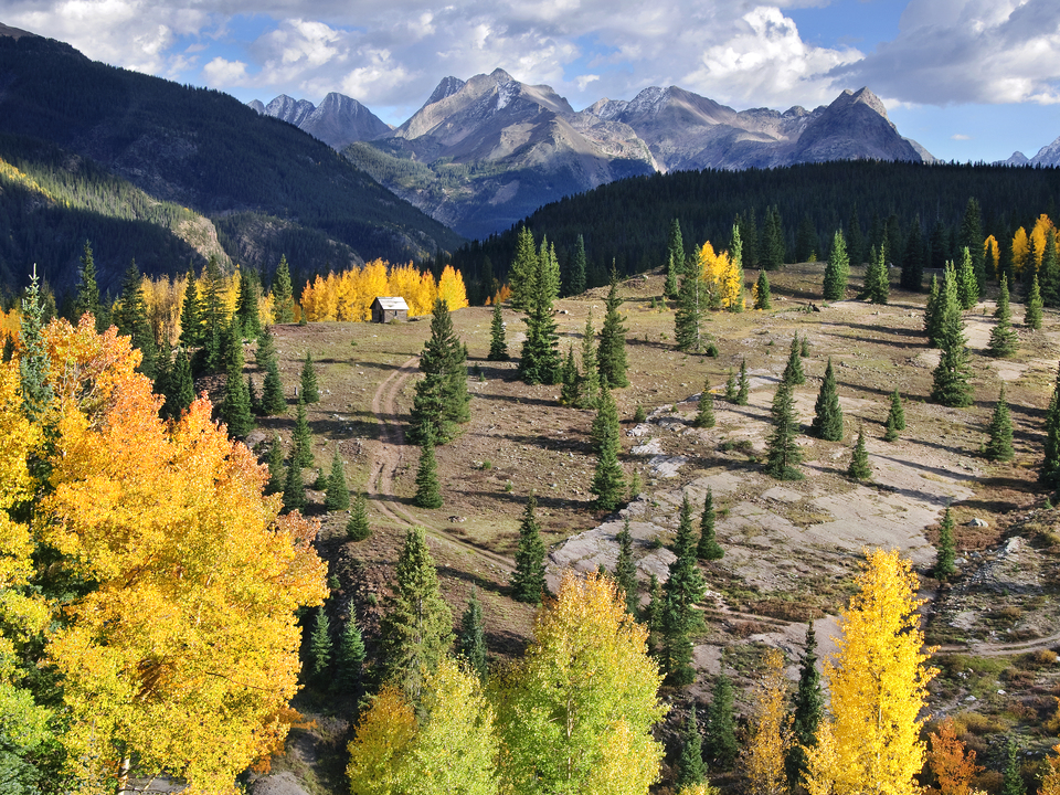 Lonely Rocky Mountain cabin in autumn