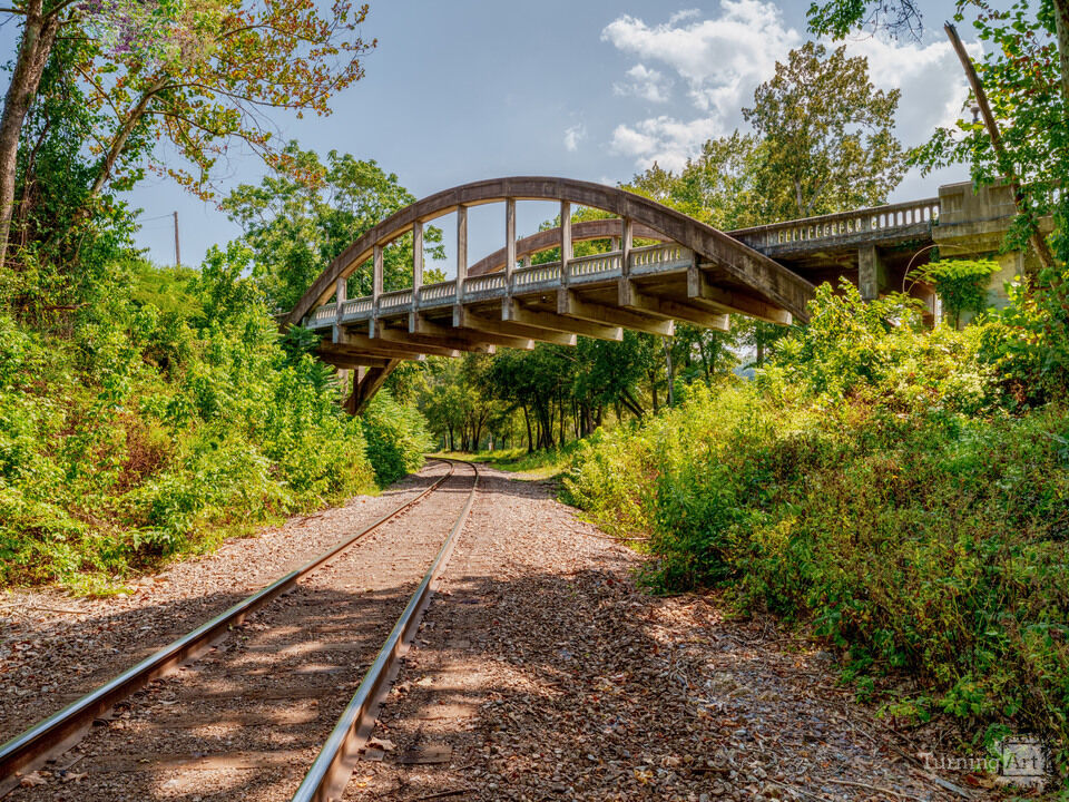 Cotter Bridge Crossing Railroad Tracks