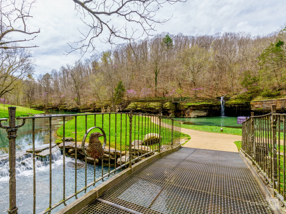 Metal Bridge And Waterfalls