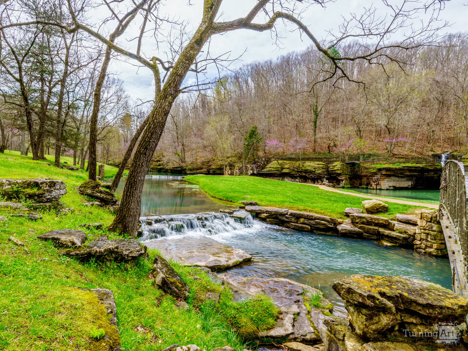 Flowing Falls Along The Creek