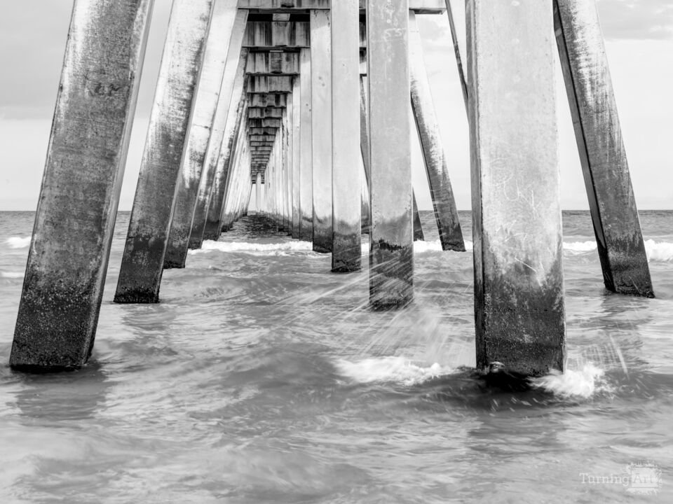 Splashing Under Navarre Pier Grayscale