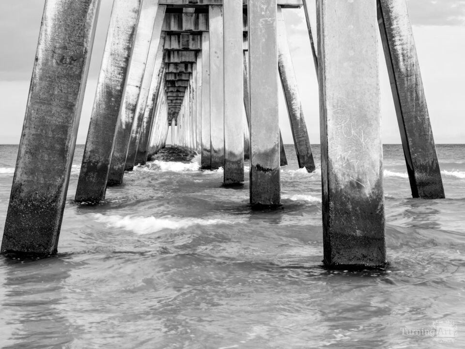 Under Navarre Pier After A Storm Grayscale