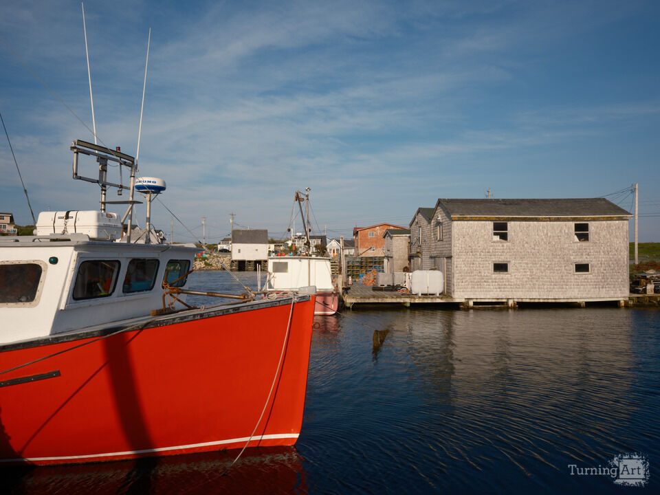 Colorful red Lobster boat docked Peggy's Cove NS 