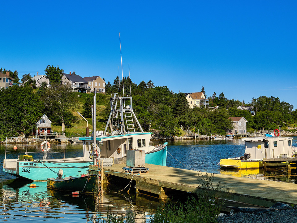 Teal Lobster Boat on Bouteliers Cove Canada