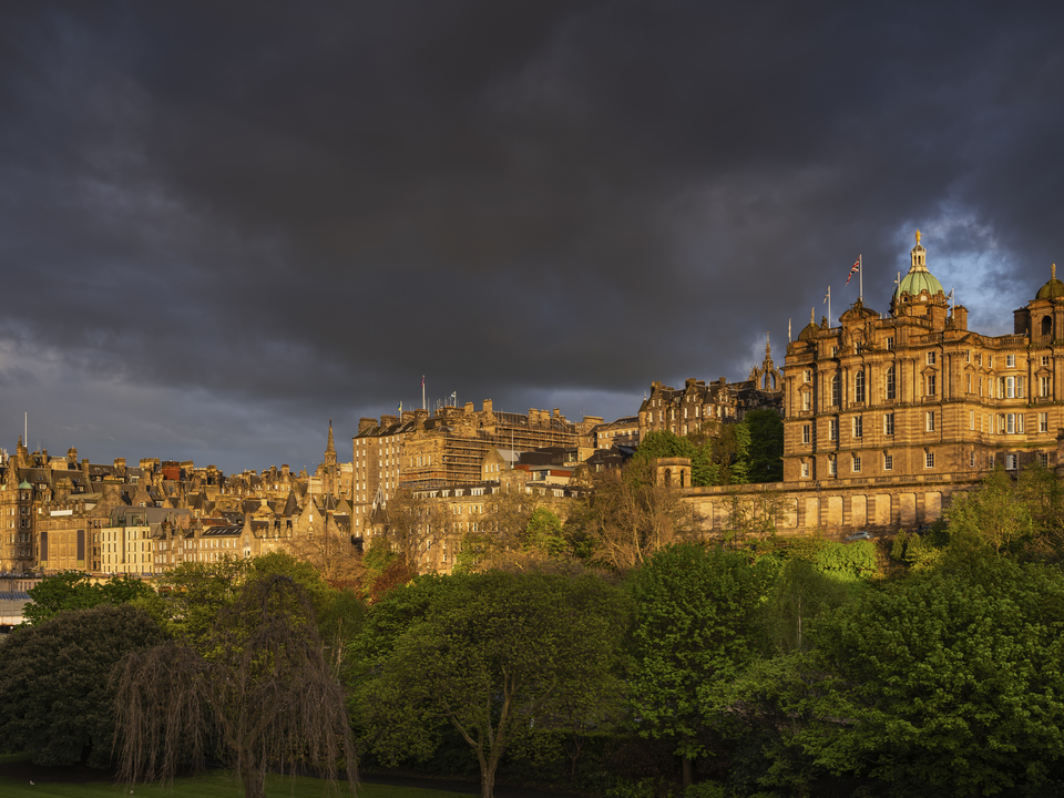 Edinburgh City Skyline At Sunset In Scotland