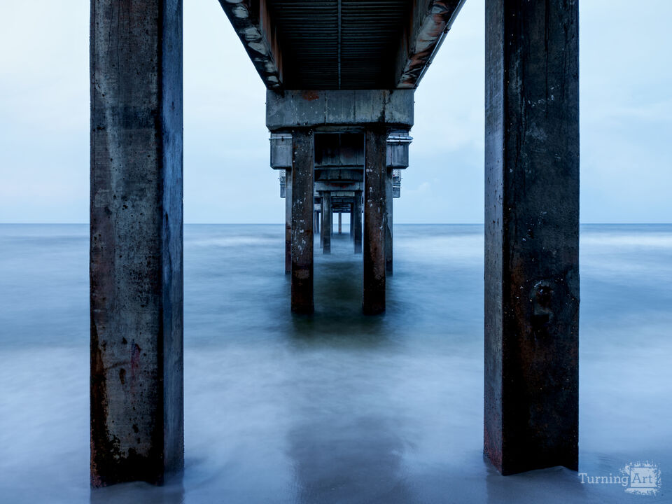 Blue Hour Under Orange Beach Pier