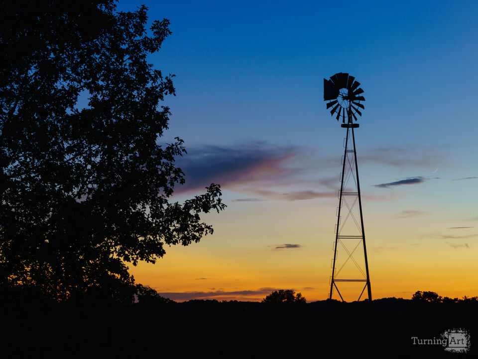 Windmill Silhouette And Moon Sliver
