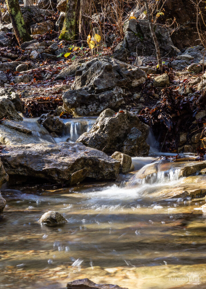 Falls Through A Rocky Creek Vertical
