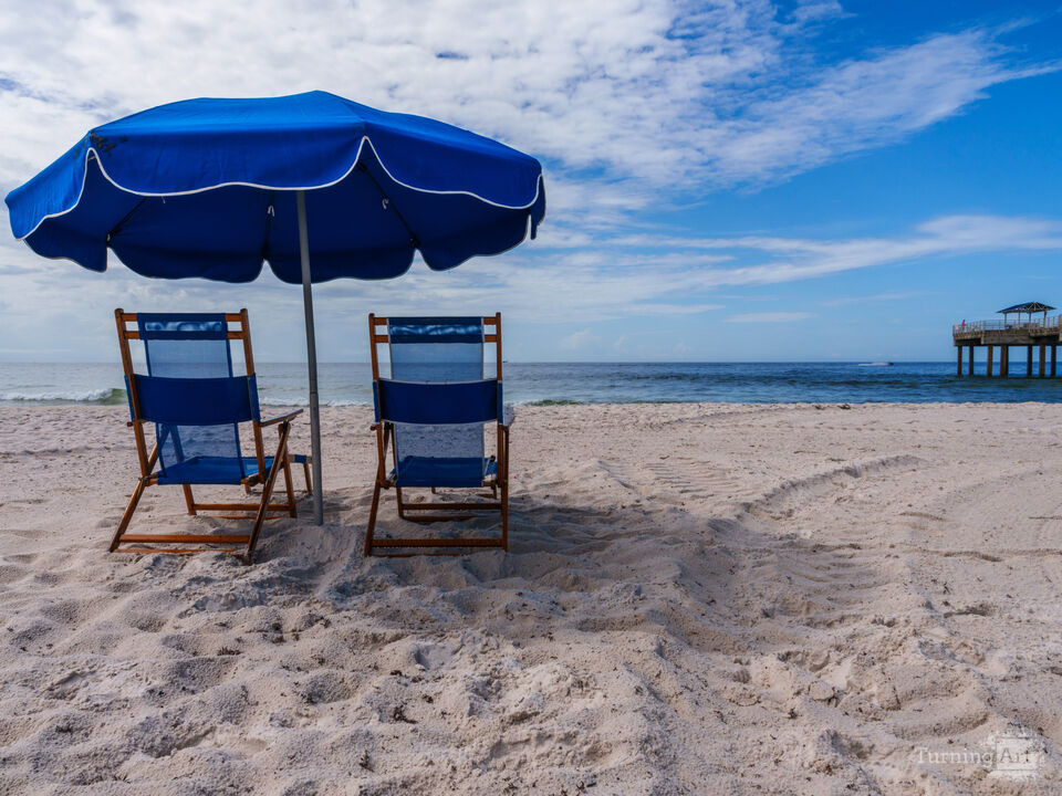 Orange Beach Umbrella And Chairs