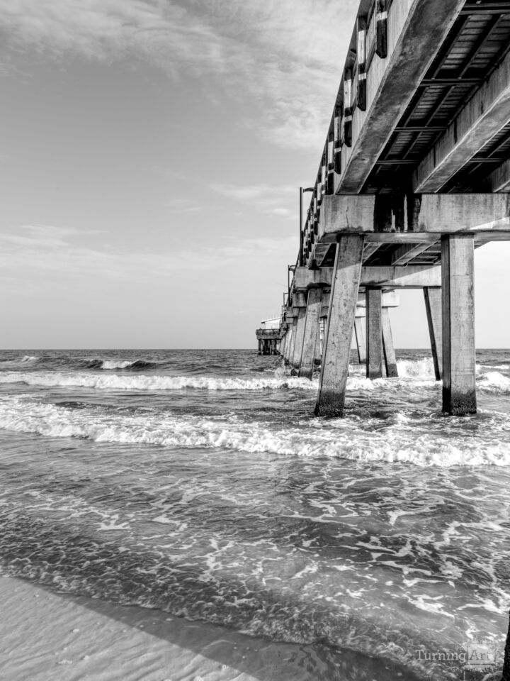 Splashing Waves Beside Gulf Shores Pier Grayscale
