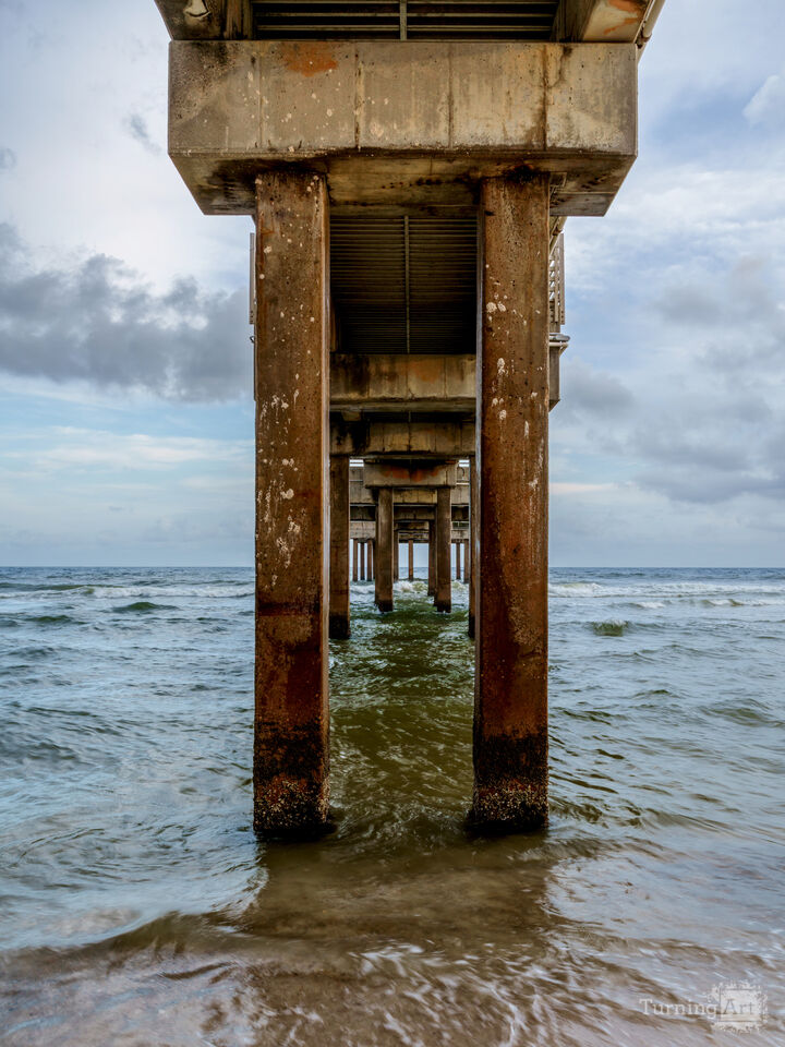 Under Middle Of Orange Beach Pier