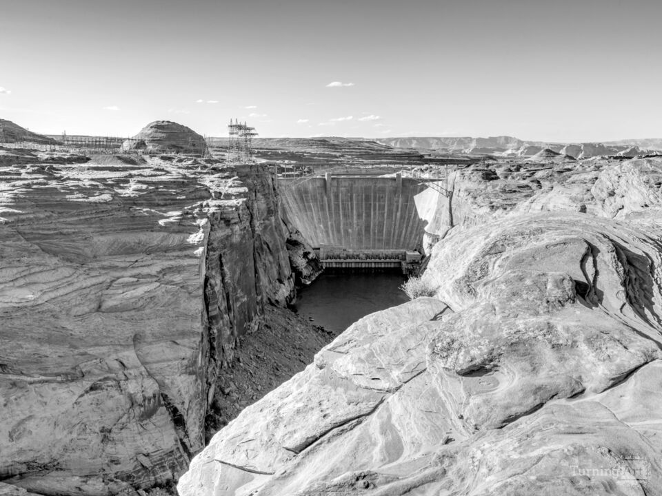Cliffside View Of Glen Canyon Dam Grayscale