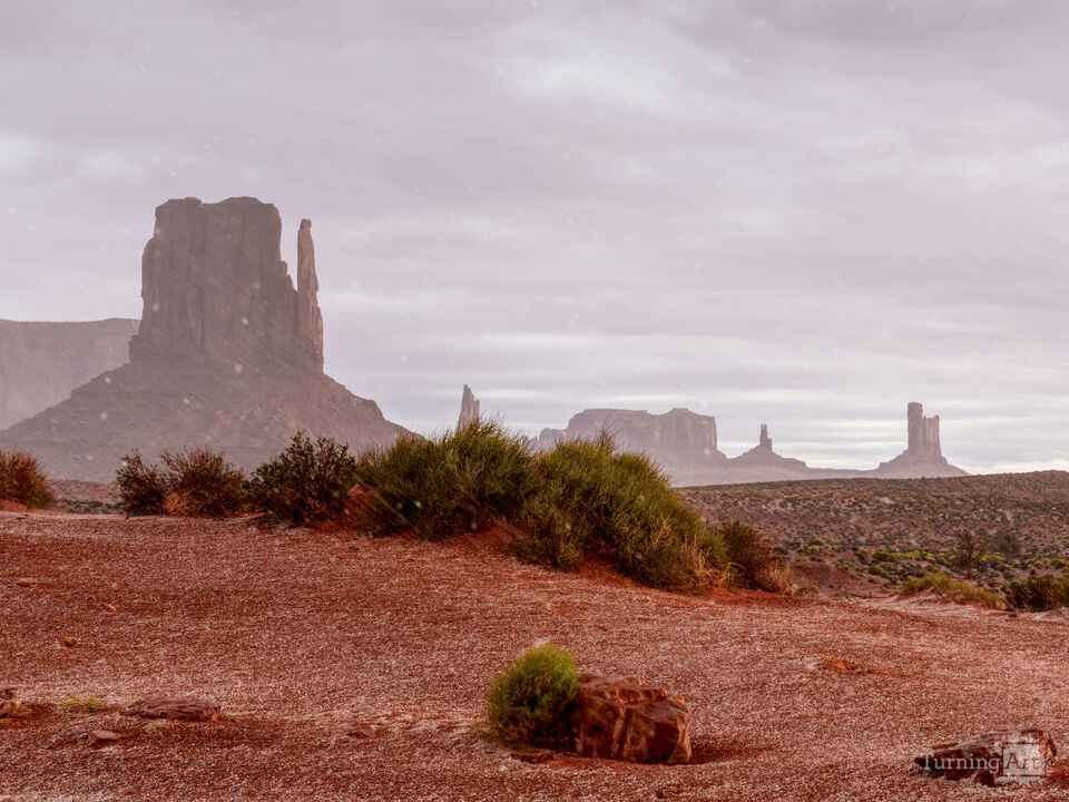 Spring Storm Falling Over Monument Valley