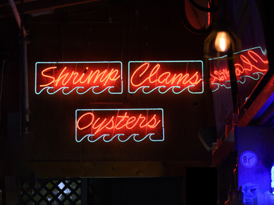 Neon sign advertising seafood
