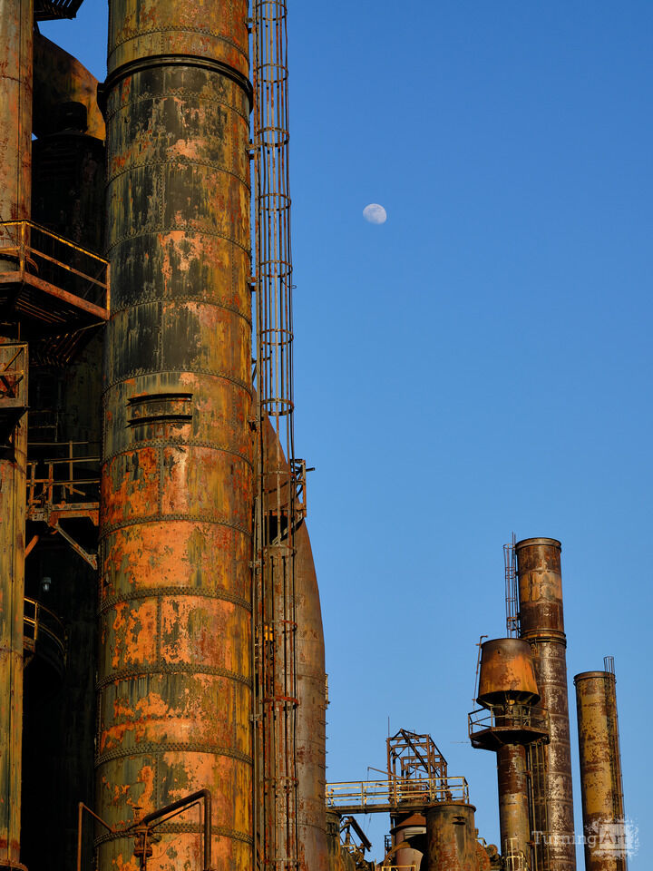 Vertical image Smokestacks, Catwalks and the Moon