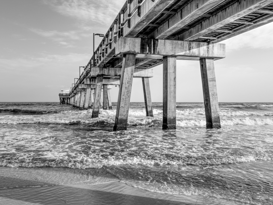 Evening Waves Beneath Gulf Shores Pier Grayscale