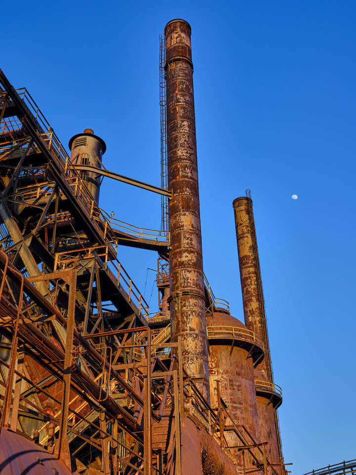 Peeling Paint and Rust Smokestacks at Sunset