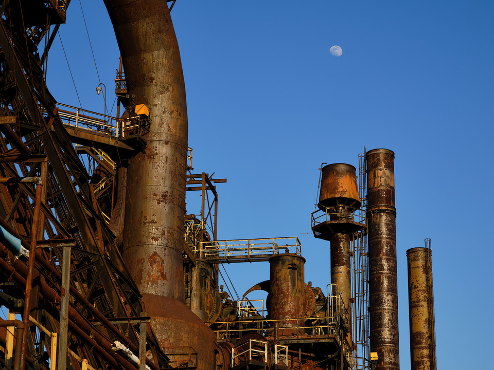 Smokestacks and Moonrise at Sunset