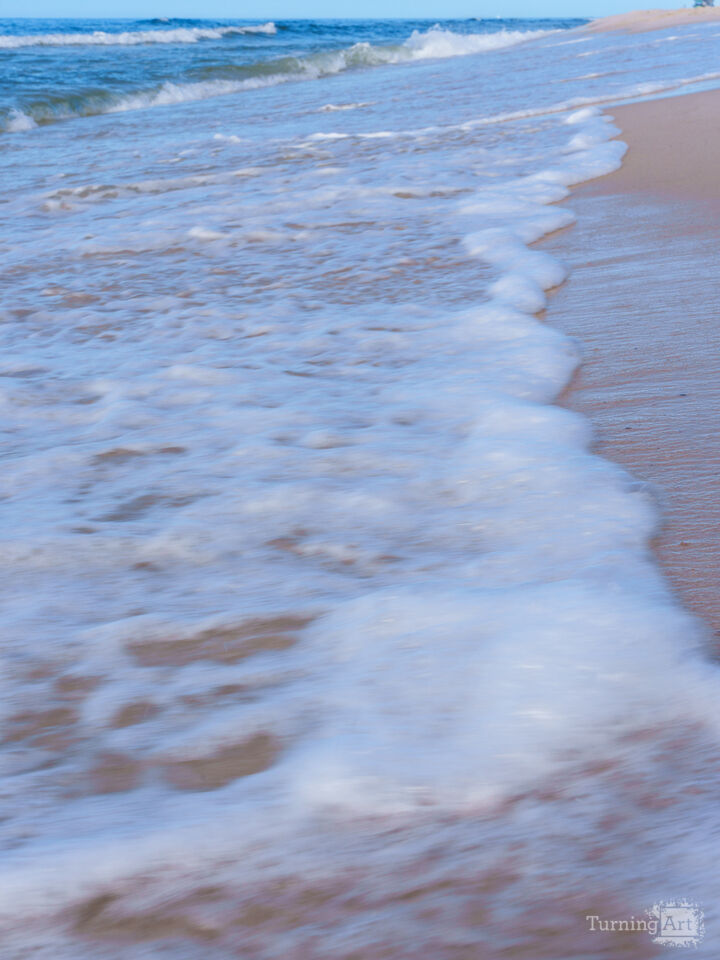 Vertical Blurred Ocean Waves Of Foam
