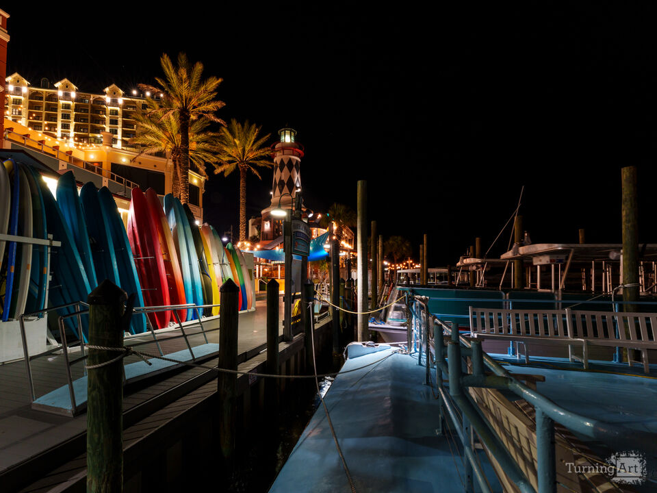 Kayaks Along Destin Harbor At Night