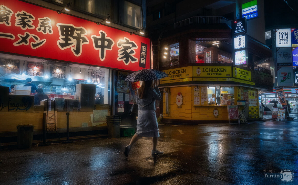 Rain Walker Under Neon Tokyo