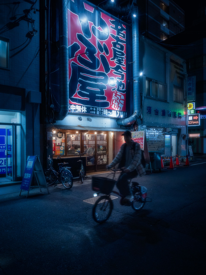 Bicycle Under Neon Rain