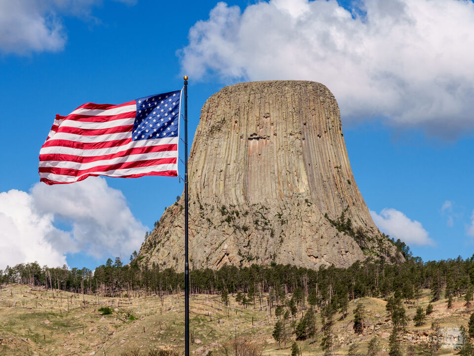 American Flag By Devils Tower