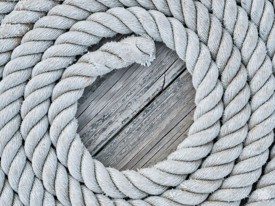 Coiled Rope on a Seaside Dock