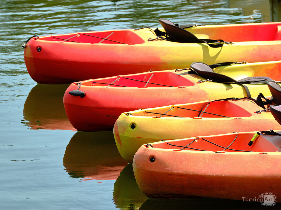 Colorful Lake Kayaks in the Water