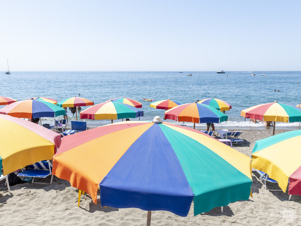 A Rainbow Umbrella on Ischia Beach, Italy