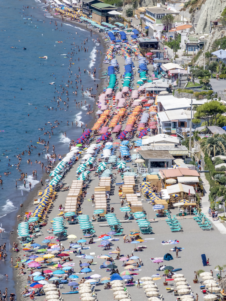 Lines of Umbrellas on Ischia Beach in Italy